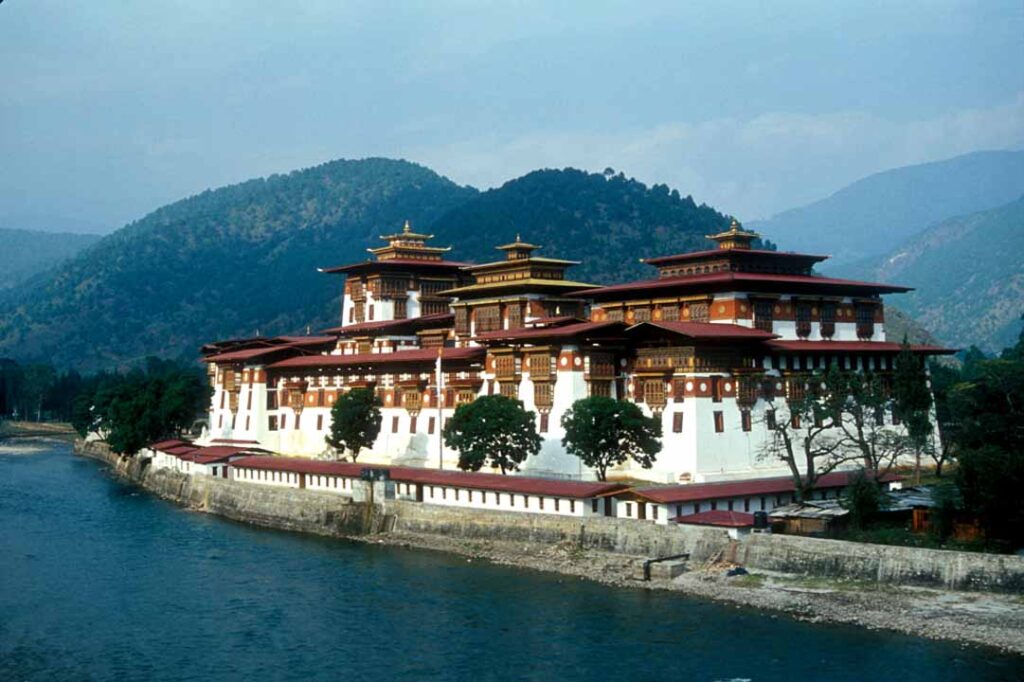 Punakha Dzong standing white at the meeting of the Pho Chhu and Mo Chhu rivers