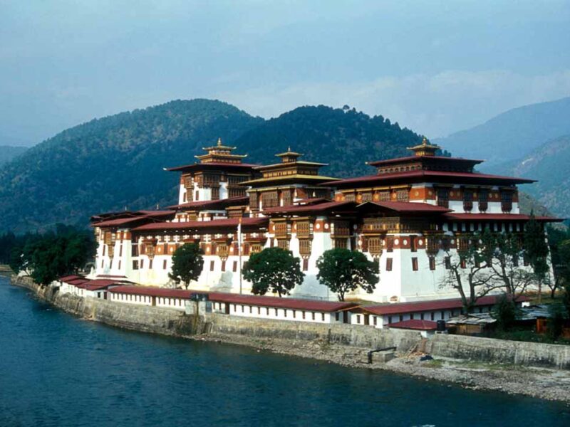 Punakha Dzong standing white at the meeting of the Pho Chhu and Mo Chhu rivers